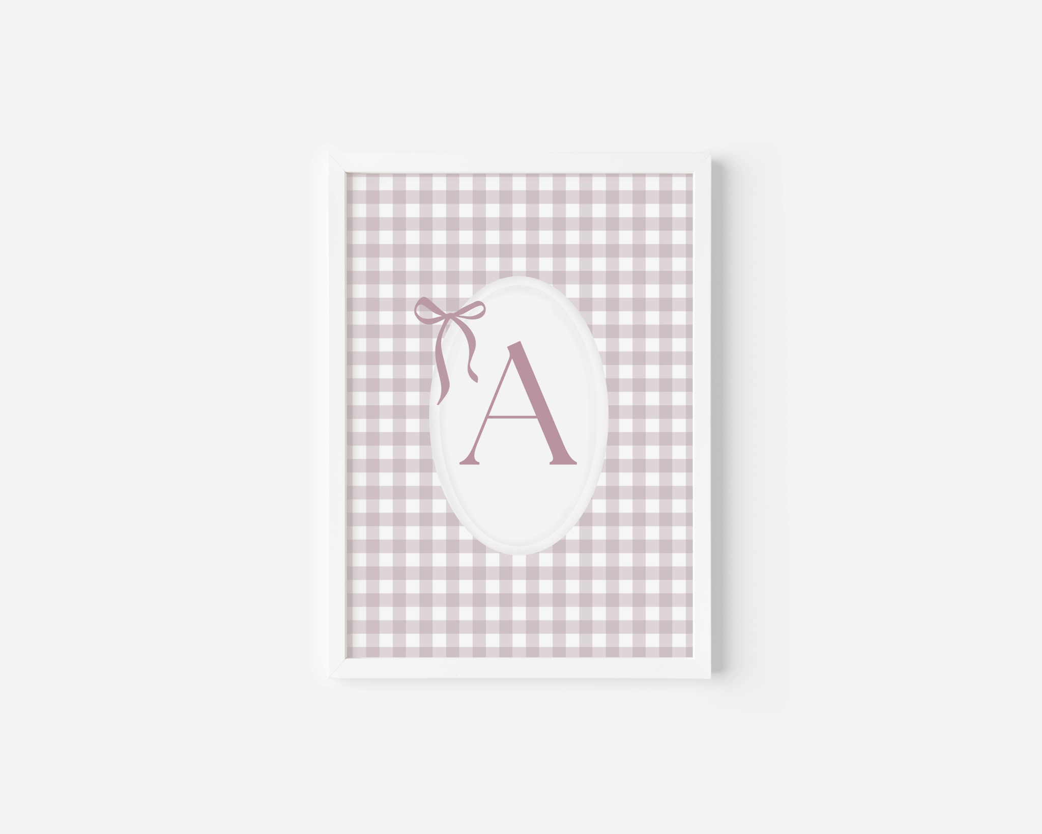 Personalized baby girl monogram wall art with pink gingham background and letter A white-framed print for nursery decor