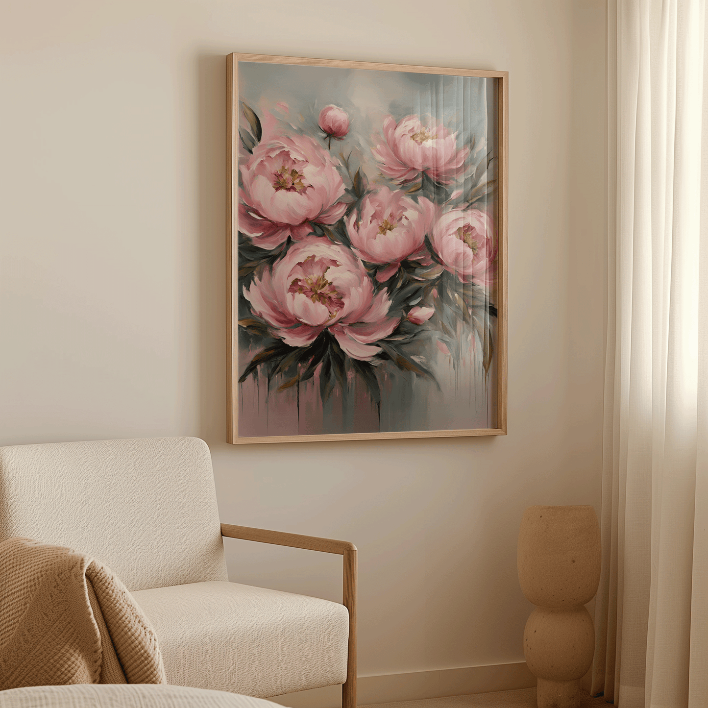 Large pink peony flower painting framed in light wood in a cozy, sunlit living room corner.