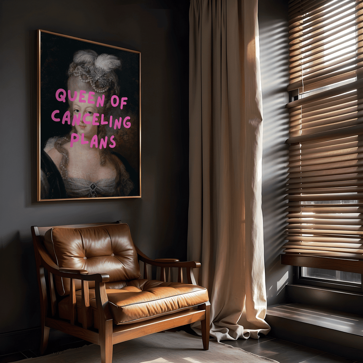Queen of Canceling Plans print above a brown leather armchair in a dark home office with wood blinds