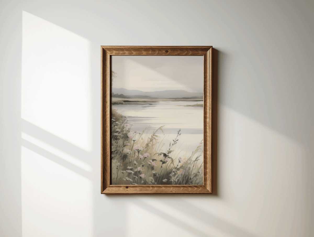 Soft landscape wall art with a lake, flowers and mountains, in rustic wood frame on minimal white wall