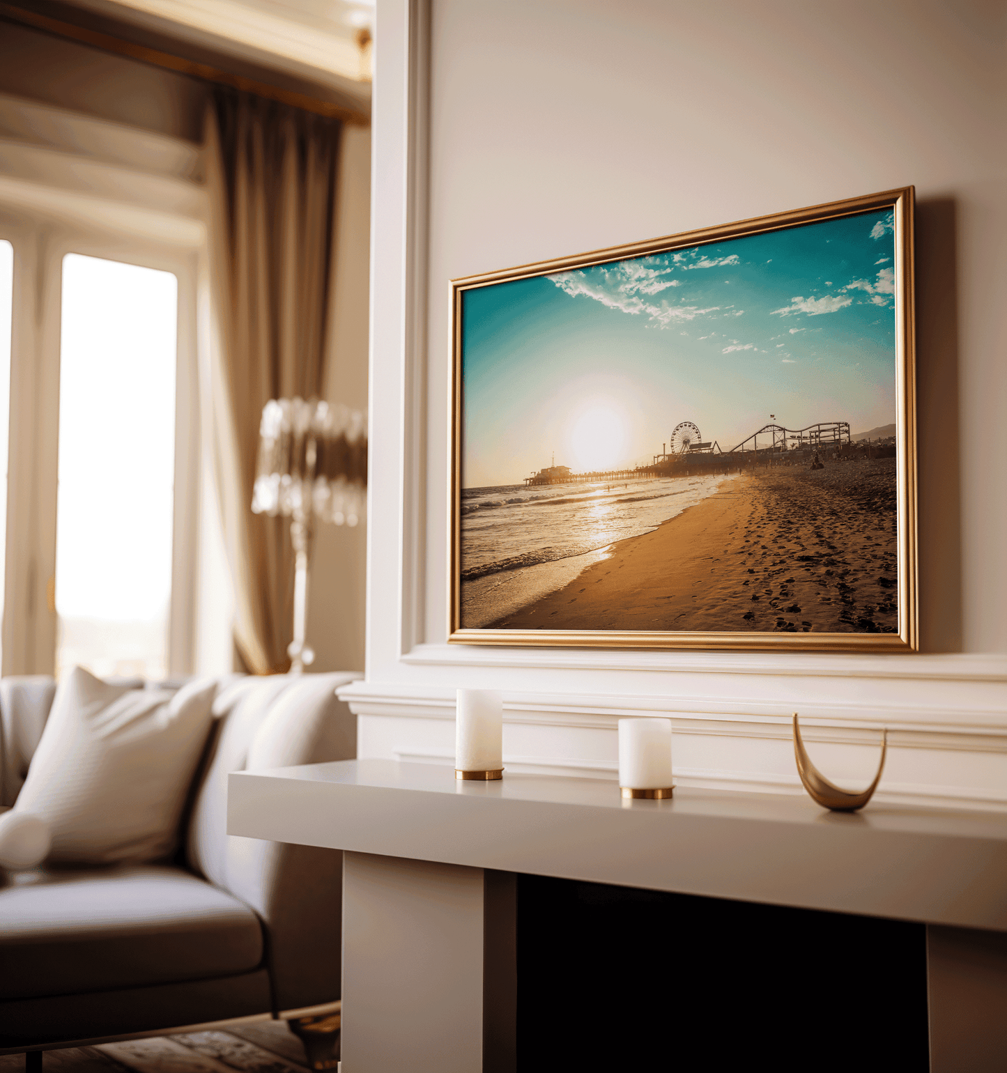 Gold ornate framed Santa Monica wall art displayed above a mantle with candles