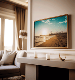 Framed Santa Monica wall art displayed above a mantle with candles