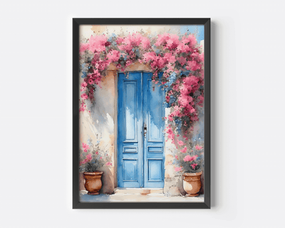 Black framed Santorini blue door wall art  wtih pink flowers on plain background