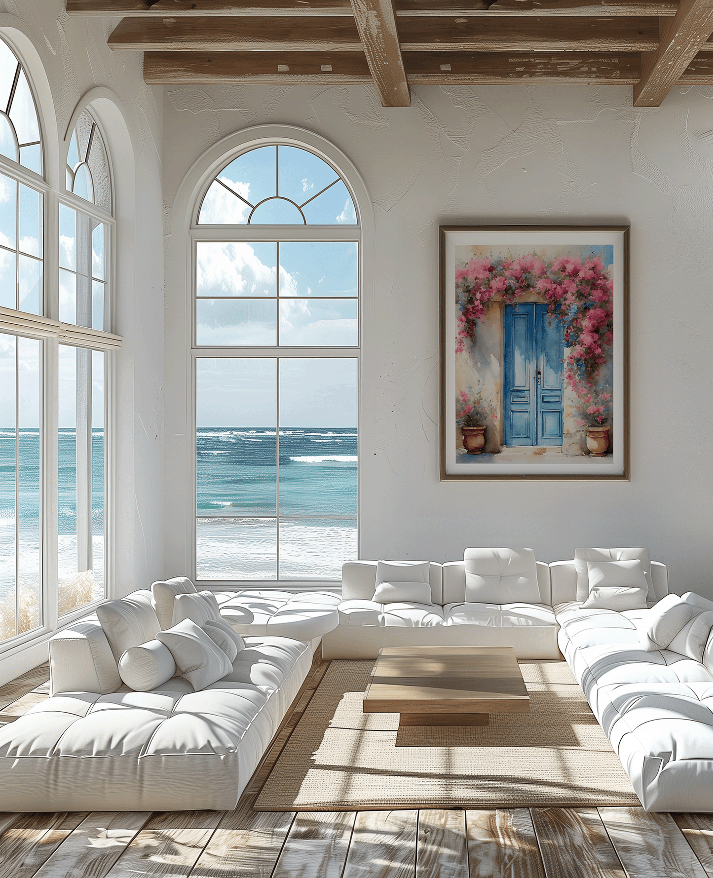 Natural framed Santorini blue door wall art above a white sofa in a coastal living room with ocean view
