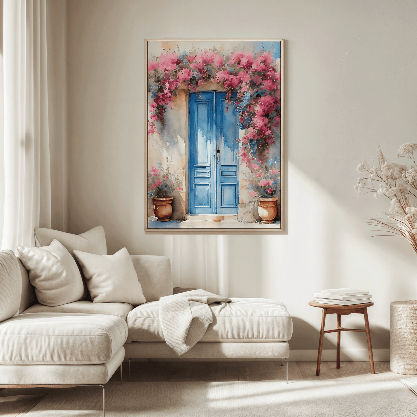 Natural framed Santorini blue door wall art above a beige sofa in a minimal living room