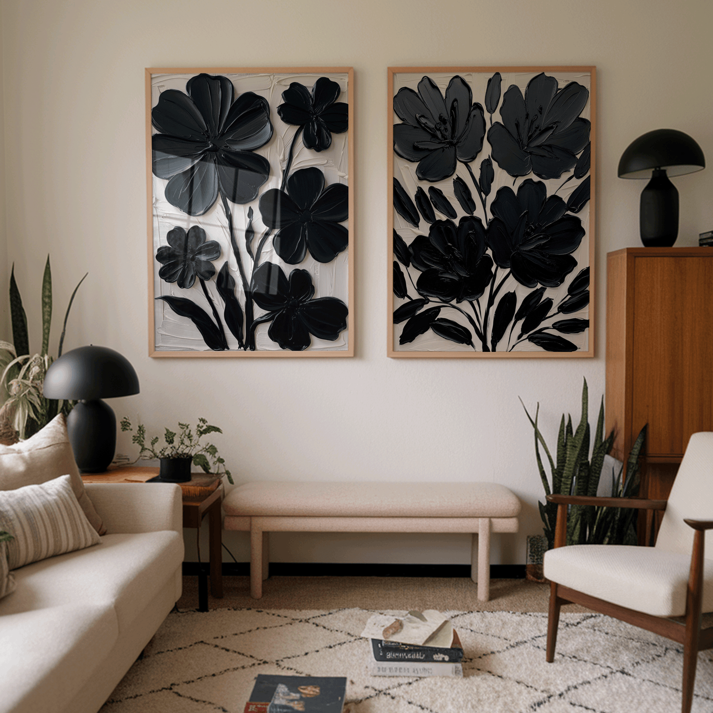 Set of 2 black floral wall art abstract flower prints framed and styled in a modern living room with neutral furniture décor