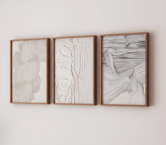 Set of 3 wooden-framed abstract minimal wall art prints with a mix of black and white curved lines, all white on white faux paint texture, and beige and white curved designs for a minimalist design.