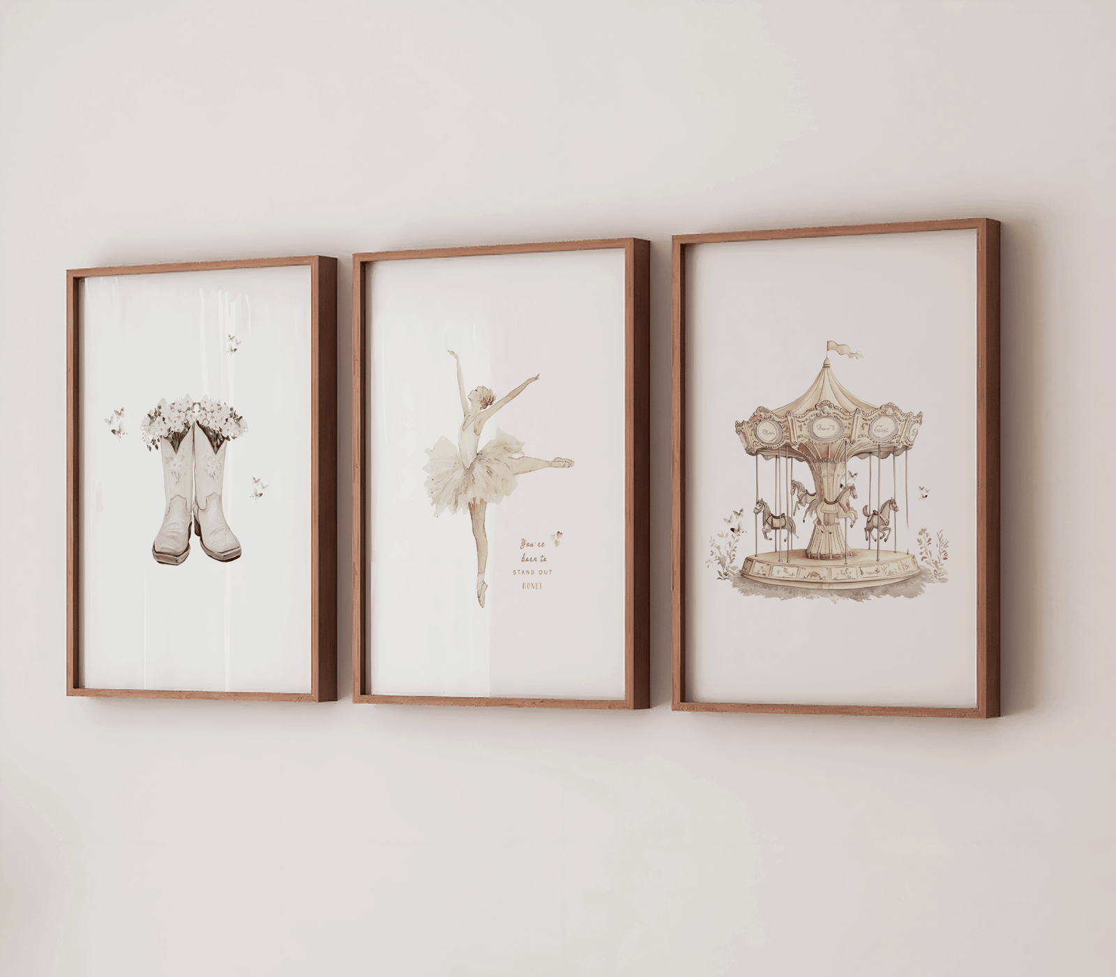 Set of 3 vintage nursery wall art prints framed on a white wall featuring a vintage carousel print in a wooden frame, a vintage ballerina in a tutu, and boots with flowers and butterflies
