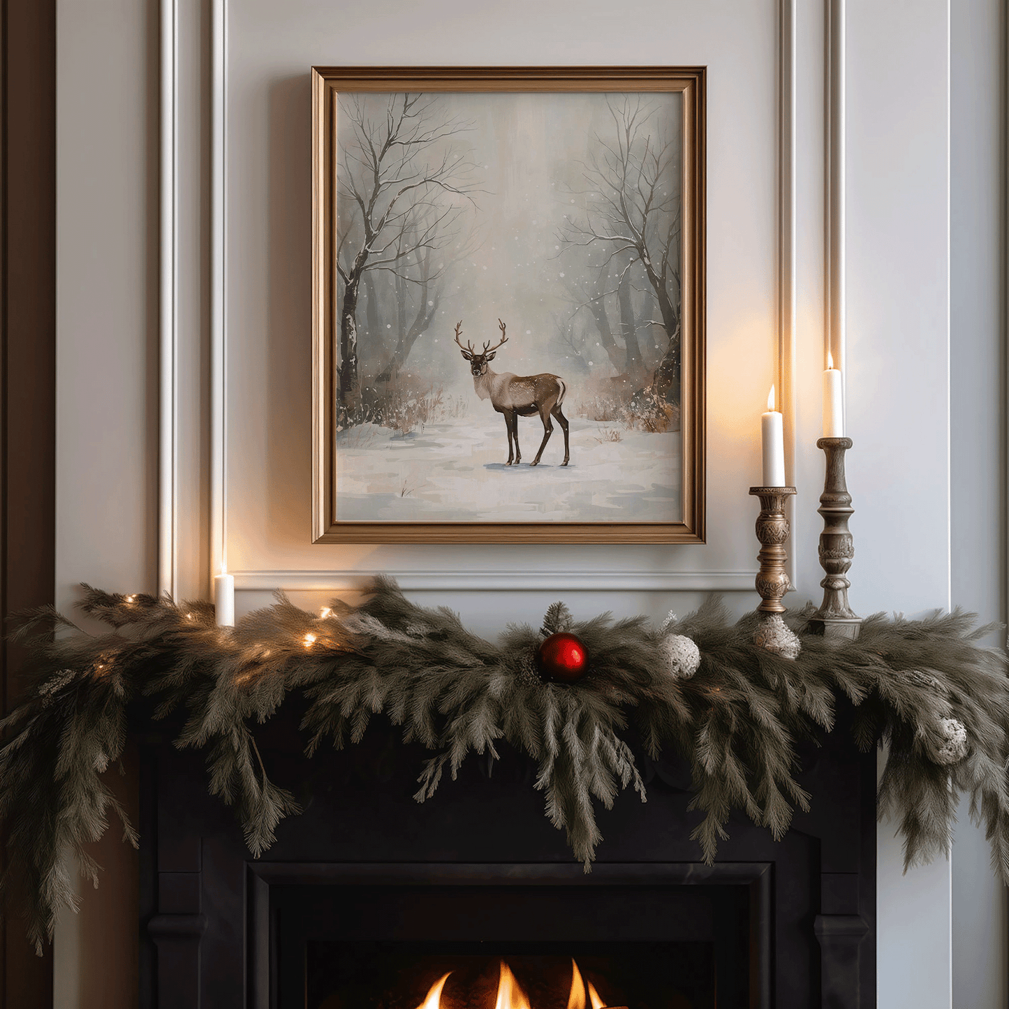 Framed snowy forest deer artwork hanging above a decorated holiday fireplace mantel with vintage brass candlesticks, glowing garland lights, and soft evergreen branches — creating a warm, neutral Christmas atmosphere in a classic winter-inspired living room.