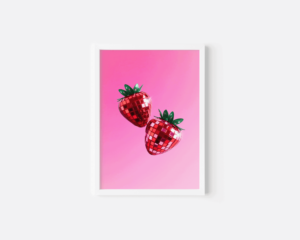 Strawberry disco ball print in a small white frame on a white background