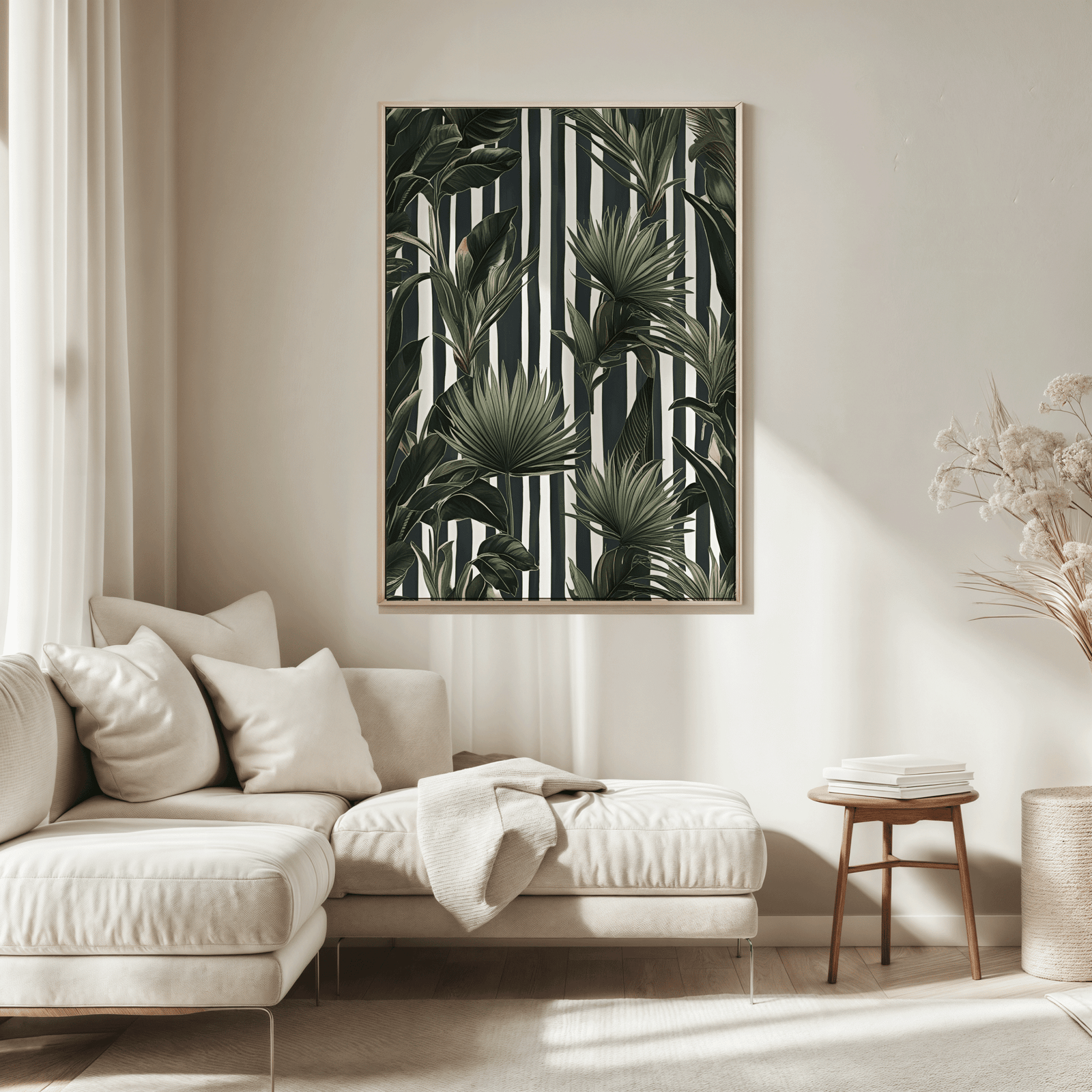 Striped tropical canvas wall art in a natural wood frame above a cream sofa in a modern living room