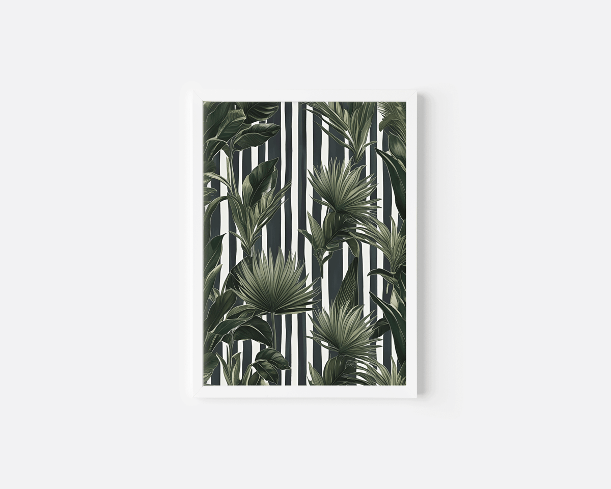 Striped tropical wall art in a white frame, green palm and banana leaves on black and white stripes