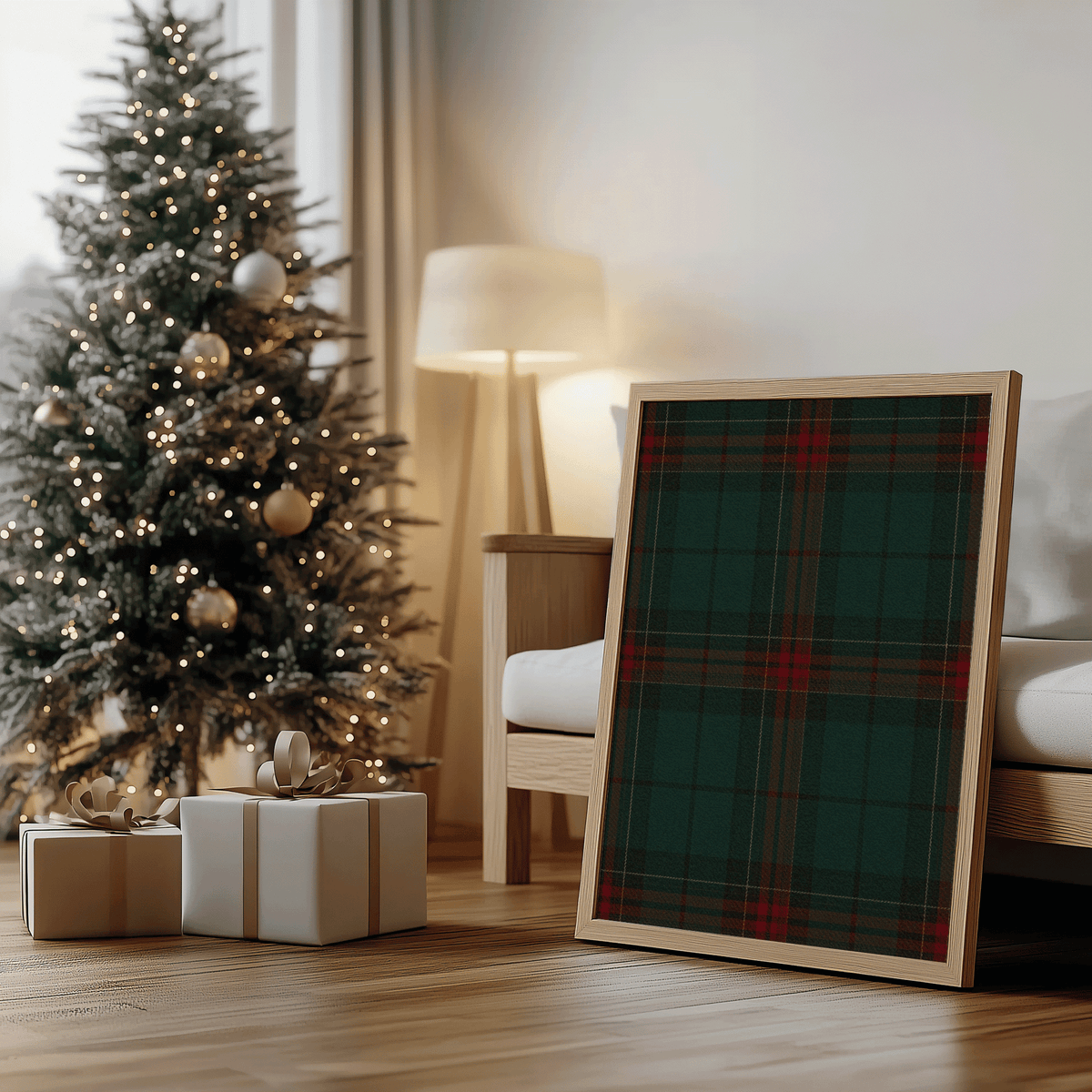 Tartan plaid wall art leaning under a Christmas tree beside wrapped gifts