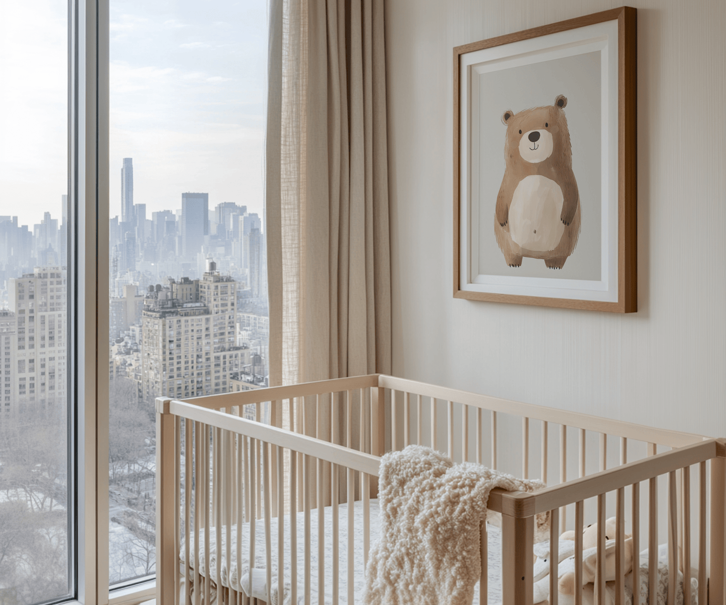 Neutral teddy bear nursery wall art print in brown wooden frame styled above crib in modern baby room
