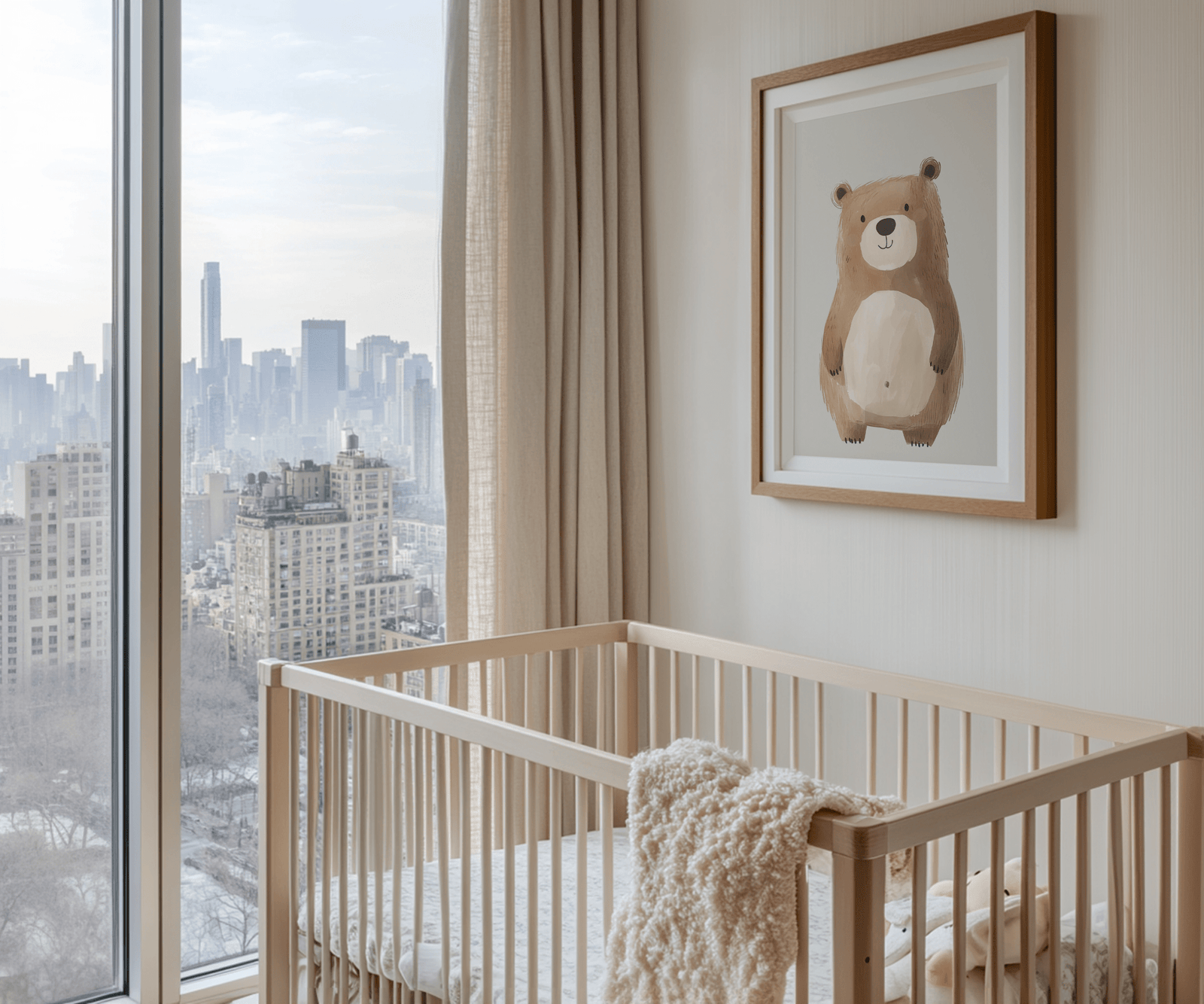 Neutral teddy bear nursery wall art print in brown wooden frame styled above crib in modern baby room