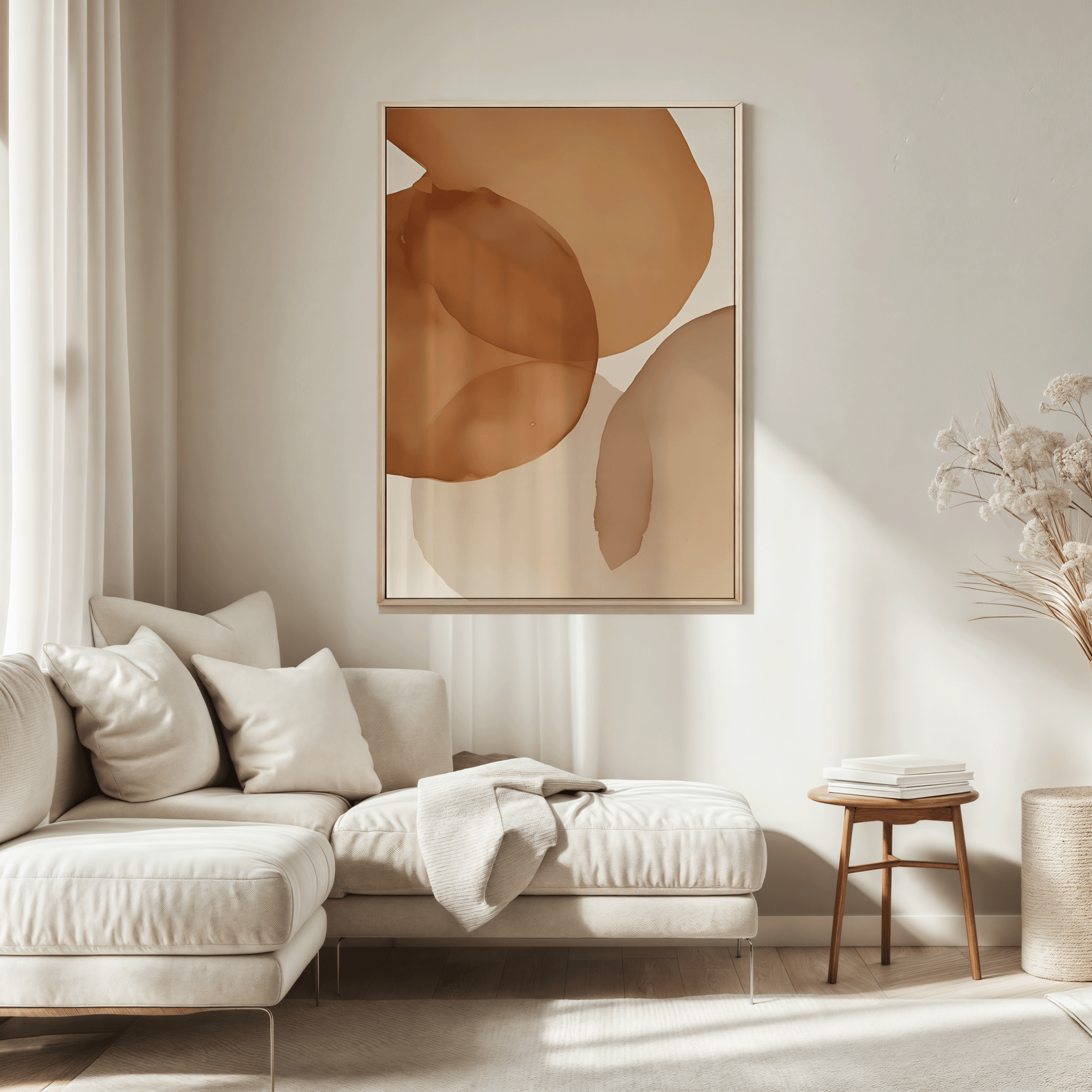 Neutral terracotta watercolor abstract canvas wall art hung above cream sectional sofa in a neutral, modern living room. 