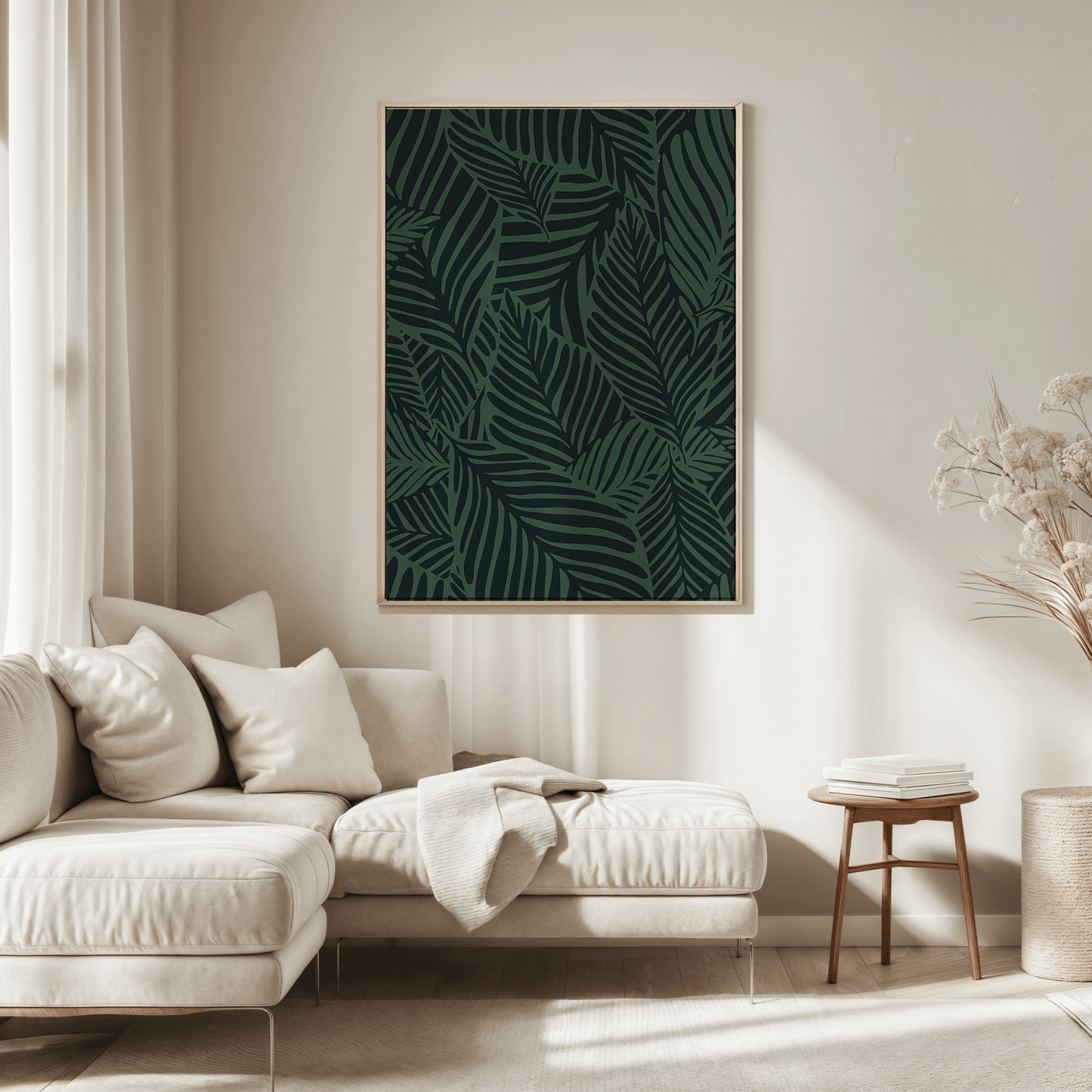 Tropical botanical canvas wall art in a natural wood frame above a cream sofa in a living room