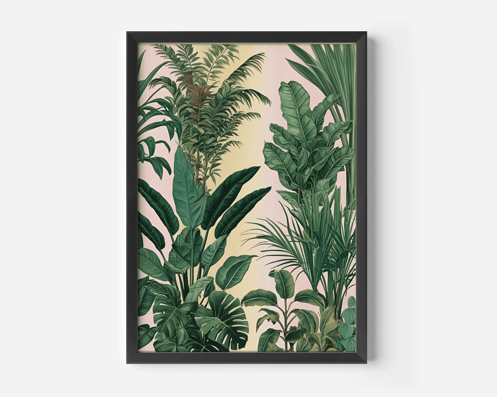 Tropical leaves wall art in a black frame with monstera, banana, and palm leaves