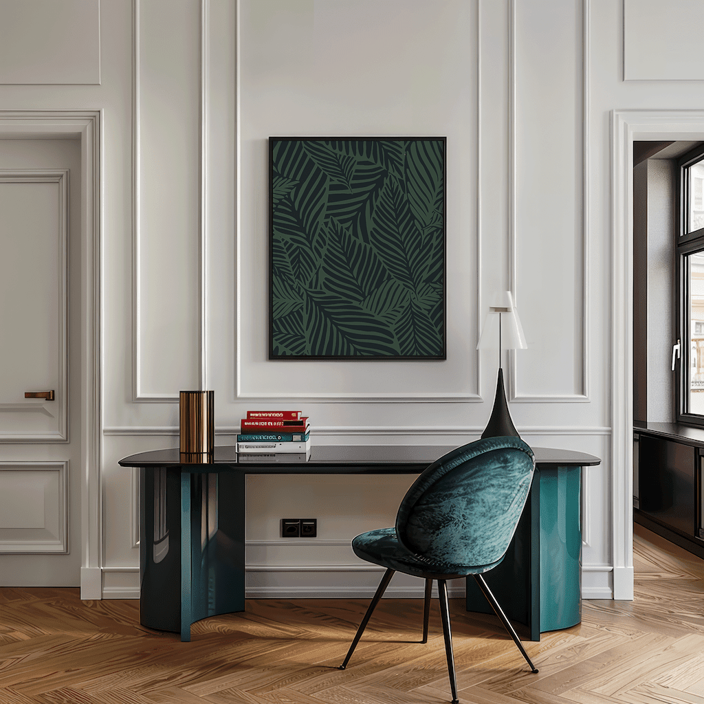 Tropical palm leaf botanical wall art in a black frame above a desk in a modern home office