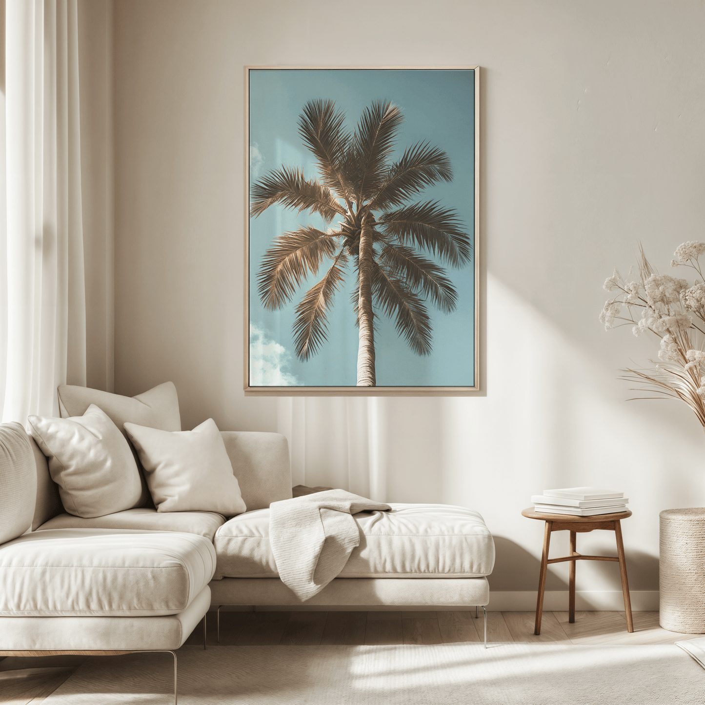 large palm tree framed wall art print in neutral living room with soft natural lighting above a cream sofa