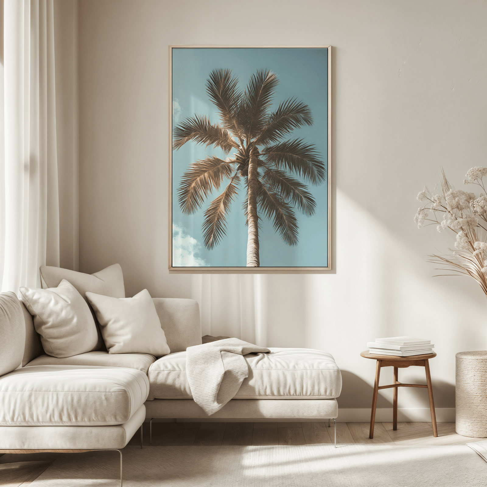 large palm tree framed wall art print in neutral living room with soft natural lighting above a cream sofa