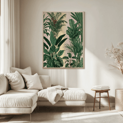 Tropical wall art in a natural wood frame above a cream sofa in a modern living room