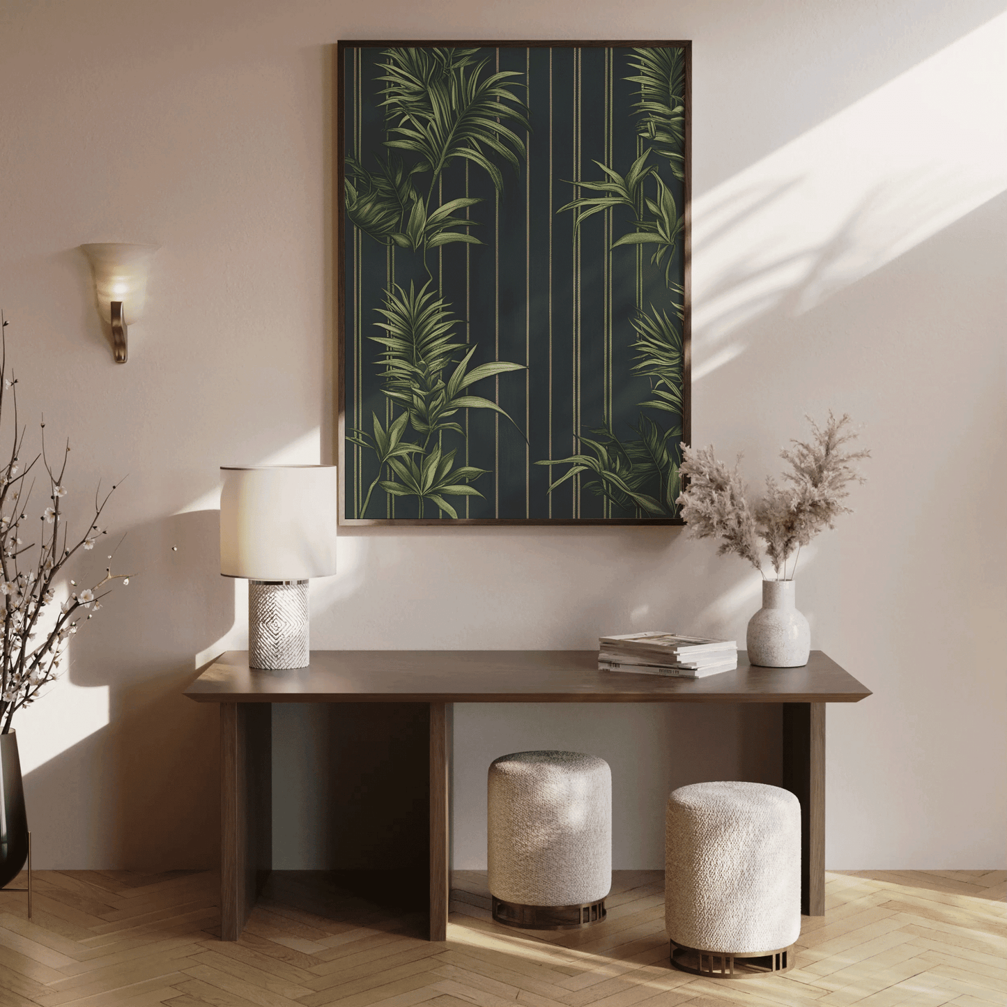Walnut framed tropical wall art above a console table in a warm entryway