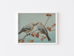 Vintage birds on a branch with berries against a light blue background a white wooden frame 