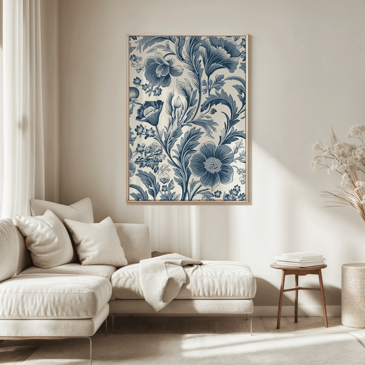 Vintage blue floral print above a cream sofa in a bright living room