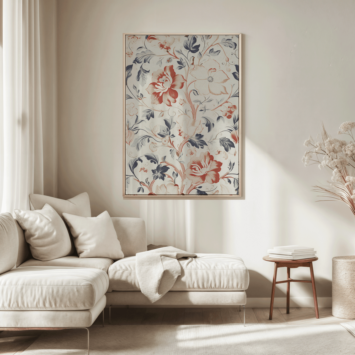 Vintage floral wall art in a natural frame above a cream sofa in a sunlit neutral living room