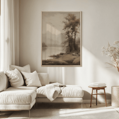 Vintage landscape wall art above neutral sofa in calm minimalist living room