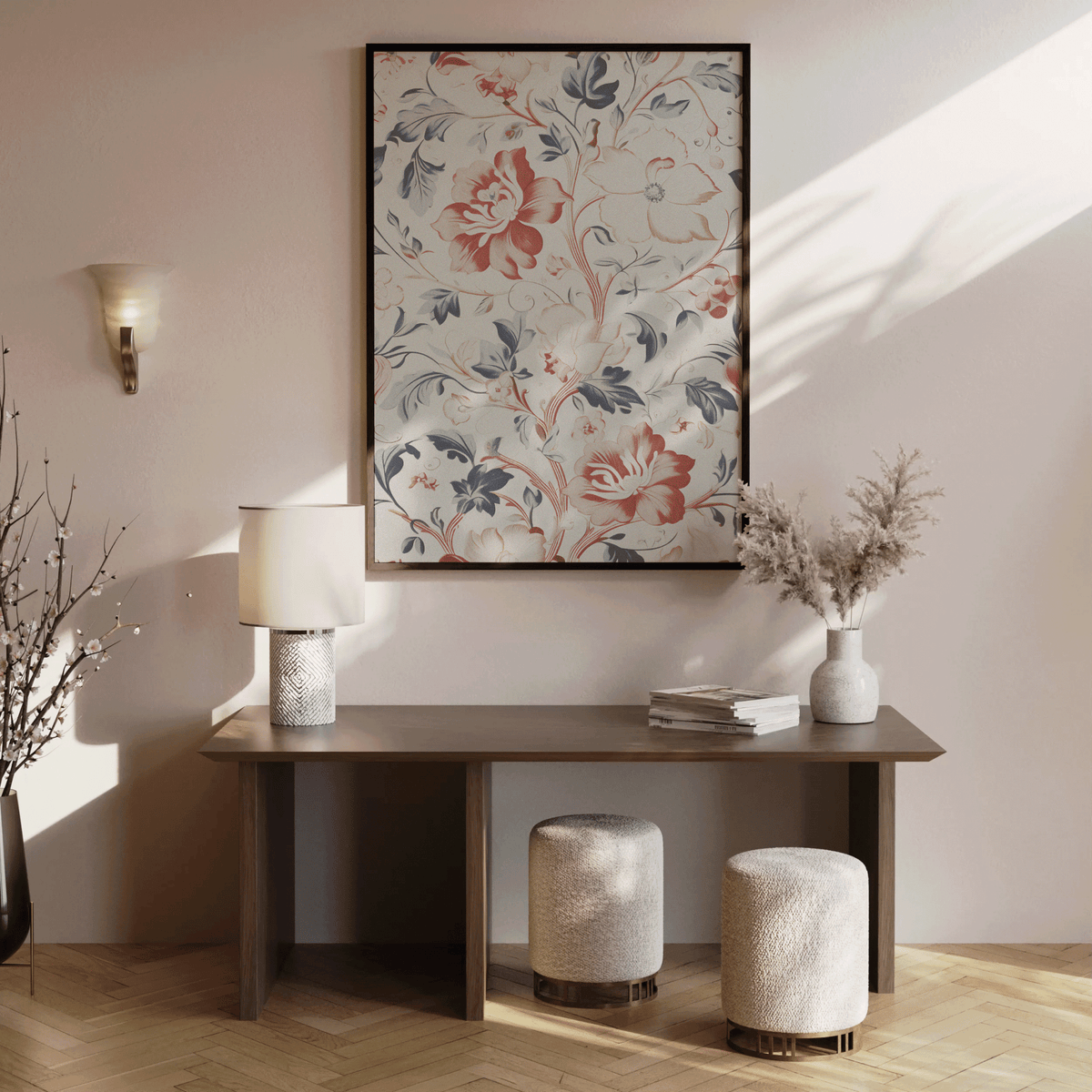 Vintage toile floral print in a black frame above a dark wood console with stools and a vase