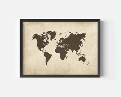 Brown and beige vintage world map wall art with a black frame on a white wall