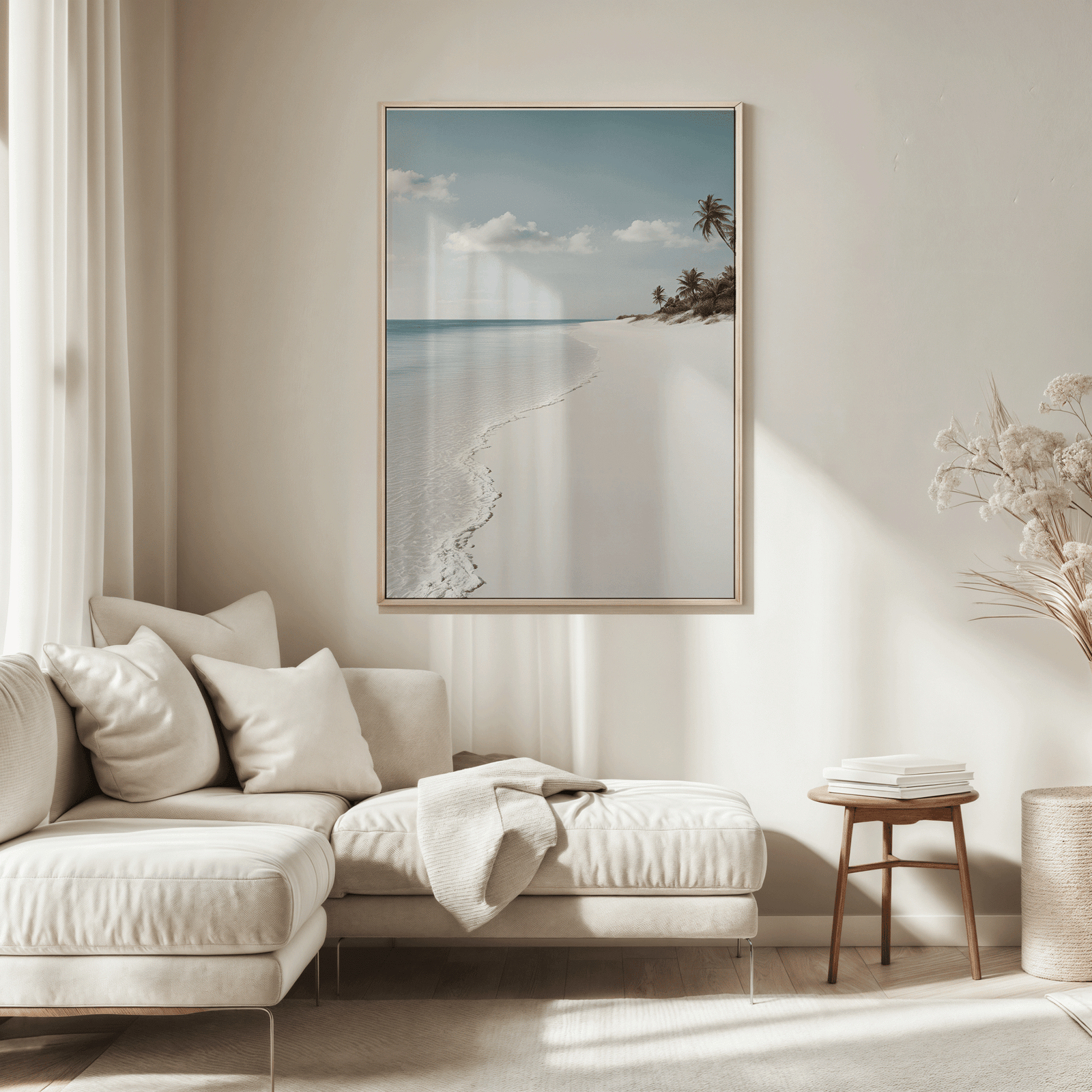 seaside wall art above beige sectional sofa, warm minimalist home with calming coastal tones