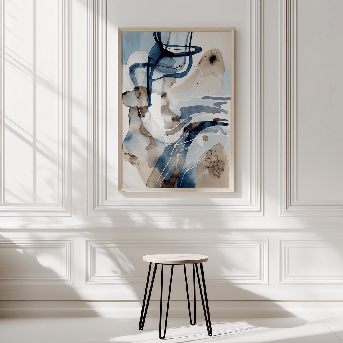 Abstract blue beige brown watercolor wall art framed on a minimalist white paneled wall