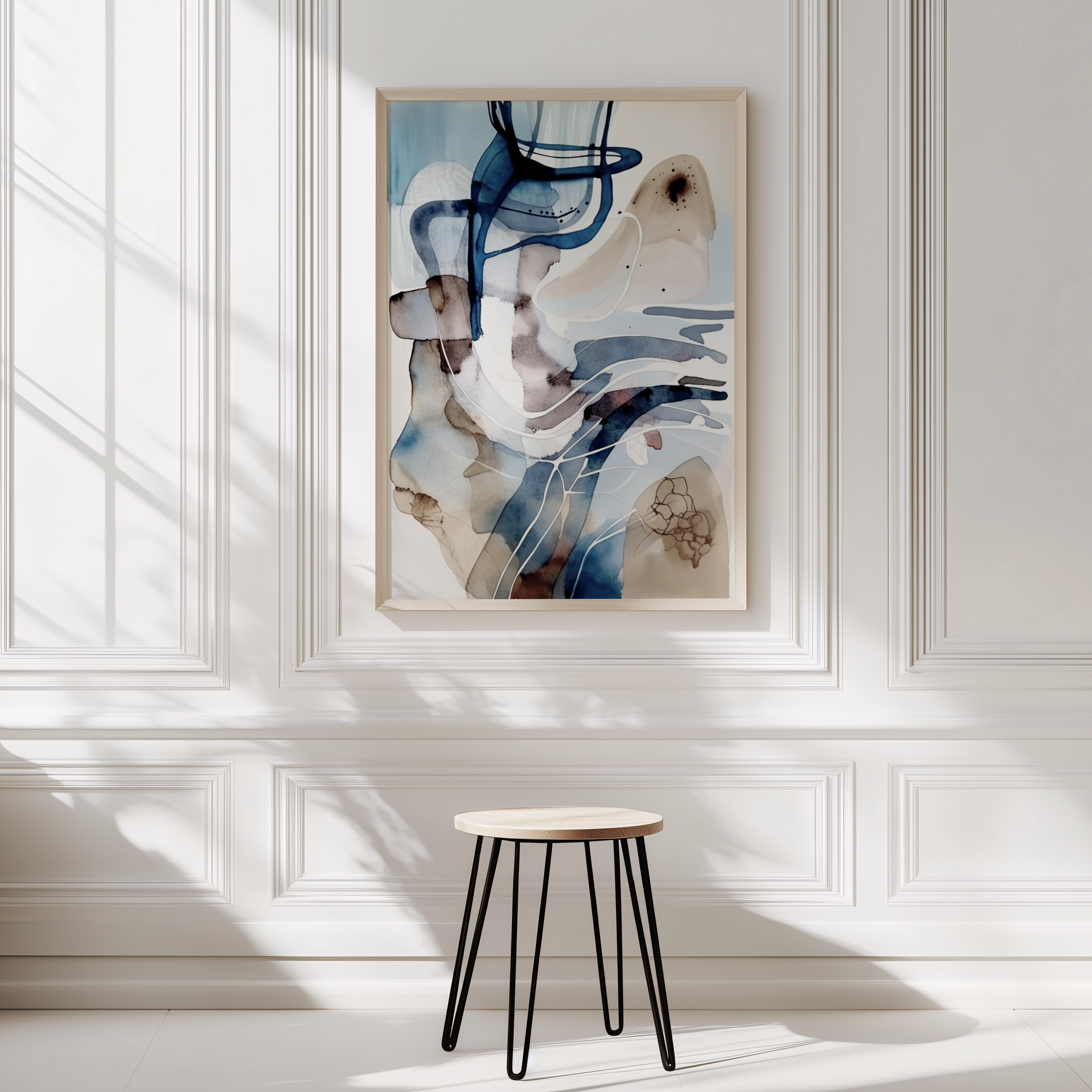 Abstract blue beige brown watercolor wall art framed on a minimalist white paneled wall