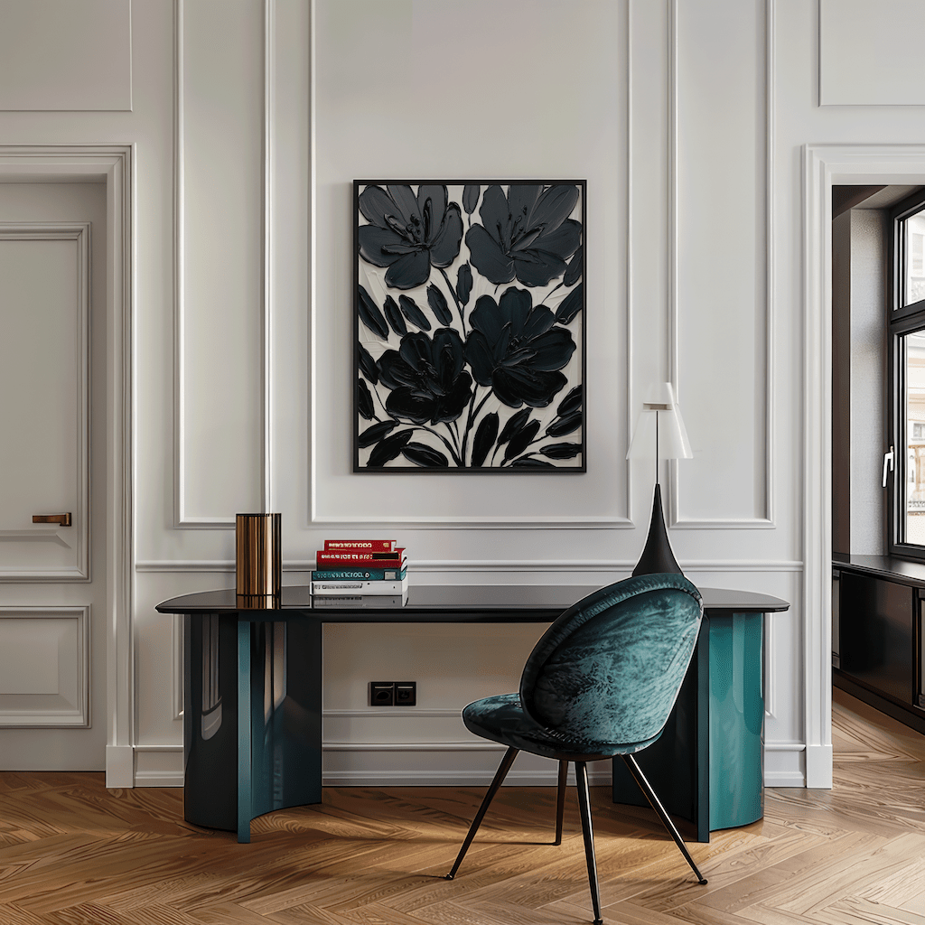 White and black floral wall art framed canvas styled above emerald green desk with velvet chair in elegant home office