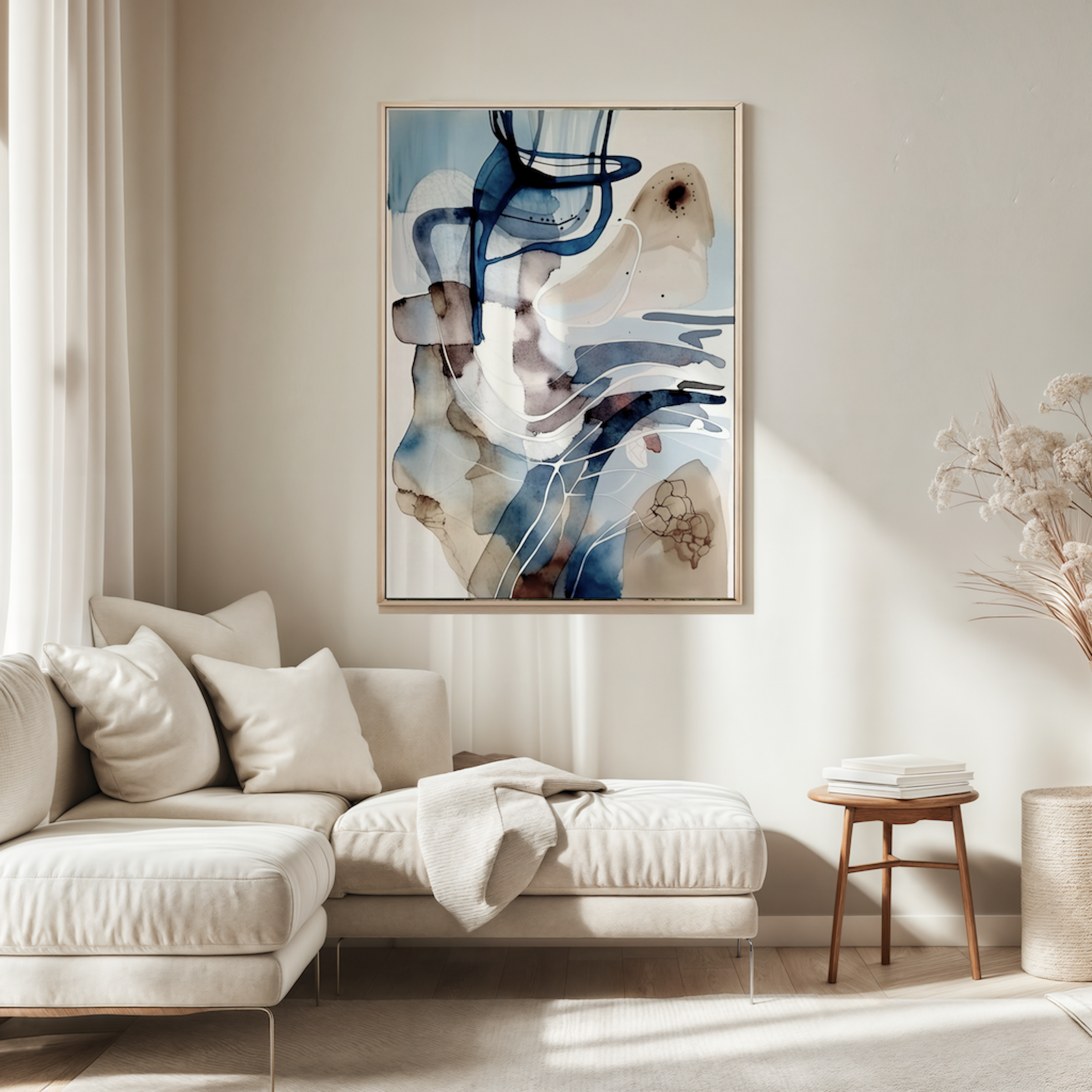 white, blue and beige abstract wall art framed above a cream sectional sofa with neutral pillows in a minimalist living room