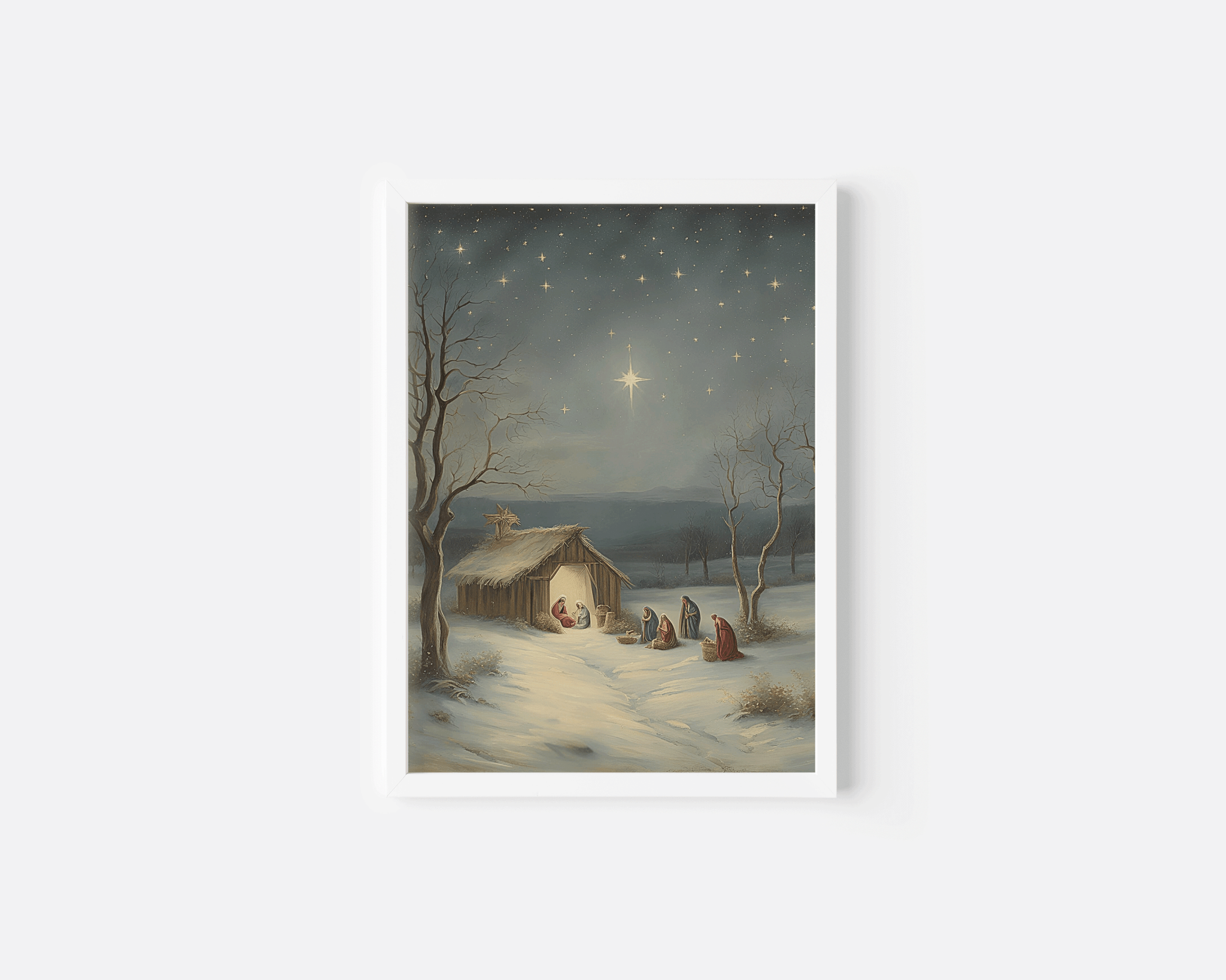 White-framed religious nativity scene wall art depicting Mary, Joseph, and baby Jesus under the Star of Bethlehem in a snowy winter landscape.