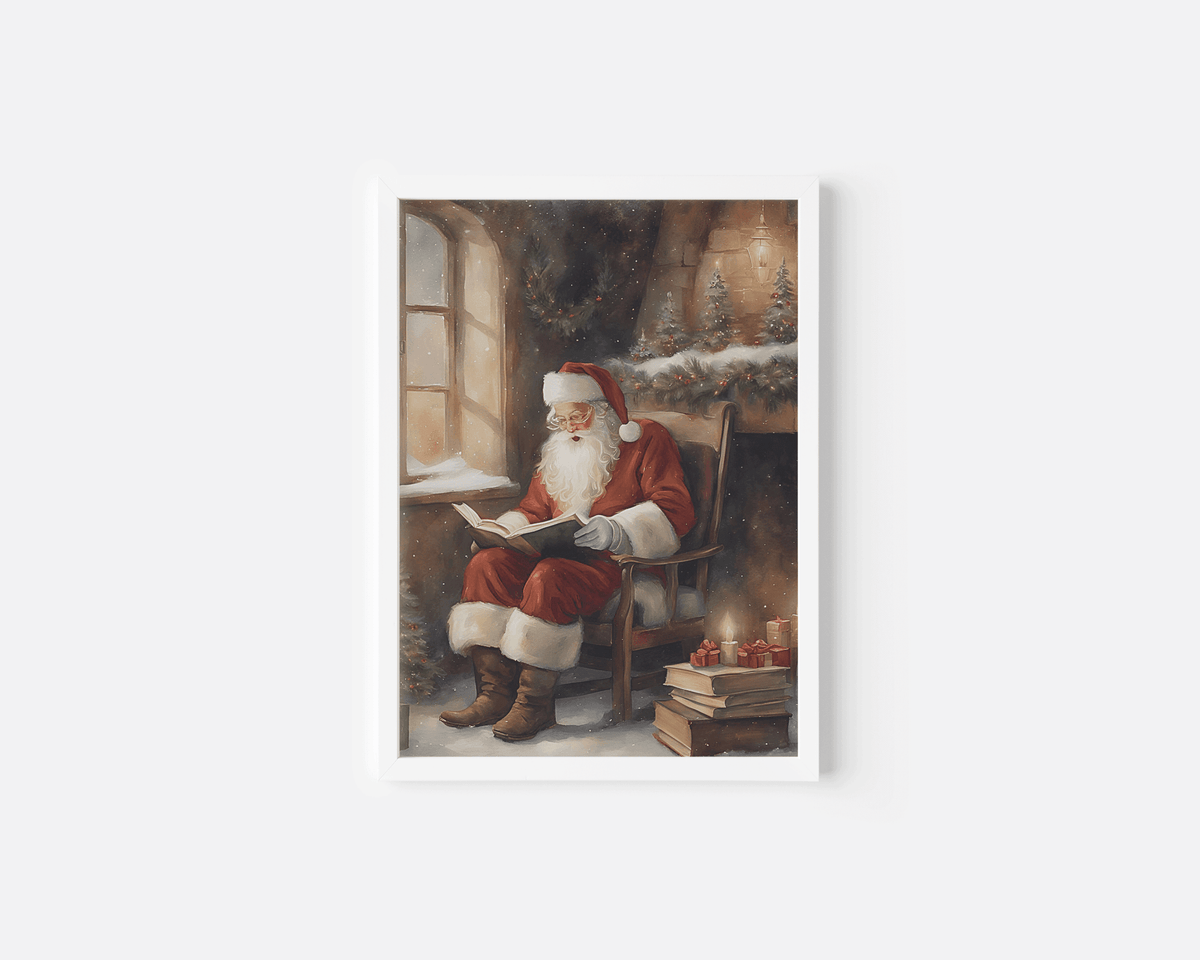 Vintage Santa reading by the fireplace print in a white frame with a snowy Christmas scene
