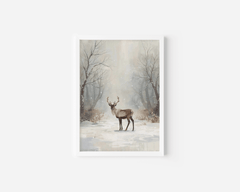 Winter deer wall art in a white frame with a misty snowy forest background