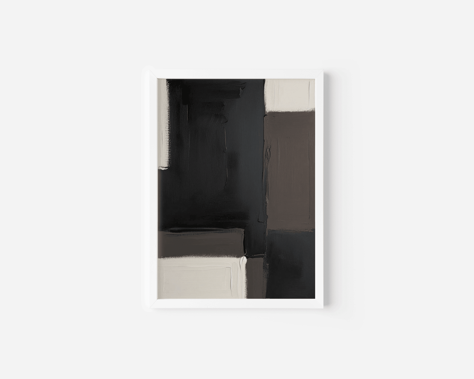 Black, brown, and beige contemporary wall art with a white frame on a white wall.