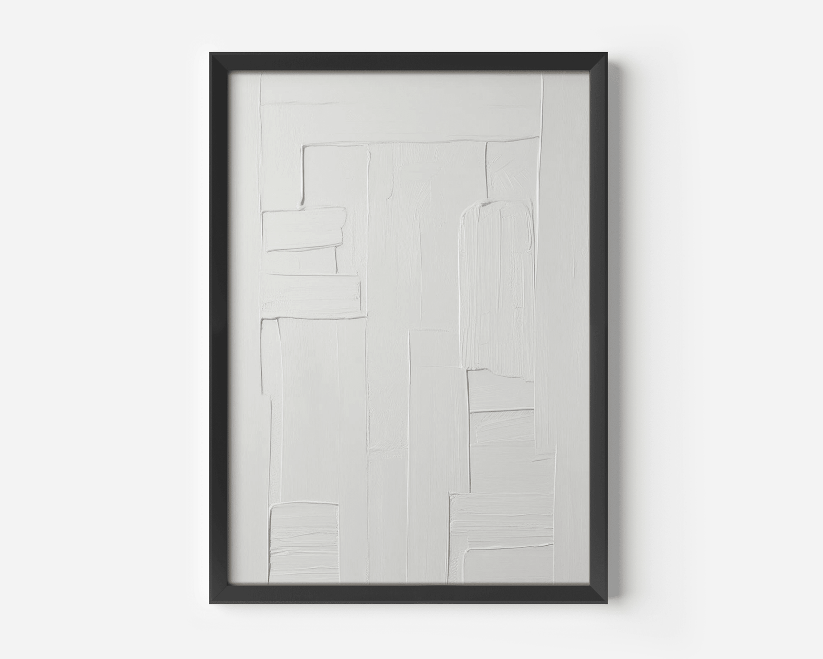 Framed all-white faux textured minimal abstract artwork with a black frame on a white background