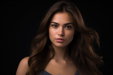A spanish beauty 20 years old with shoulder-length hair - studio photo