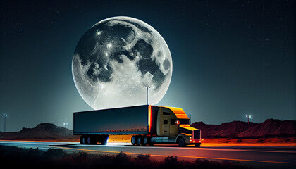 A cargo truck with a container moves along a night highway. Full moon over the horizon. Abstract illustration.