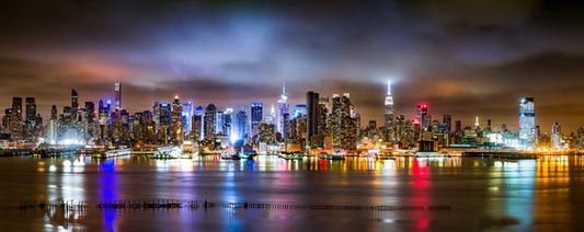 New York City Panorama on a cloudy night as viewed from New Jersey across the Hudson River